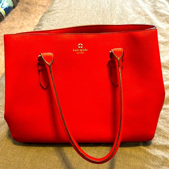 kate spade Handbags - Kate spade. Slightly used. Red leather large purse. Price negotiable.